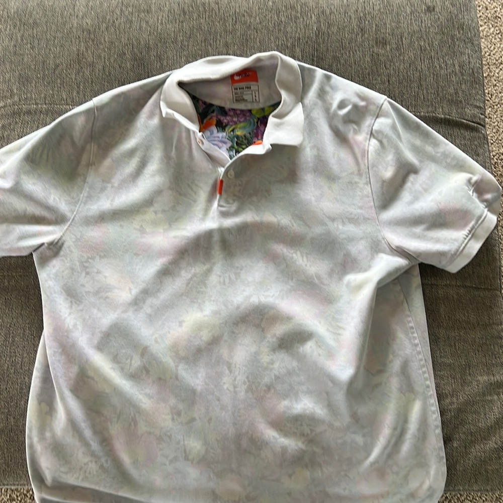 Nike Dri-Fit golf polo. Same print that Brooks Koepka won the open in.